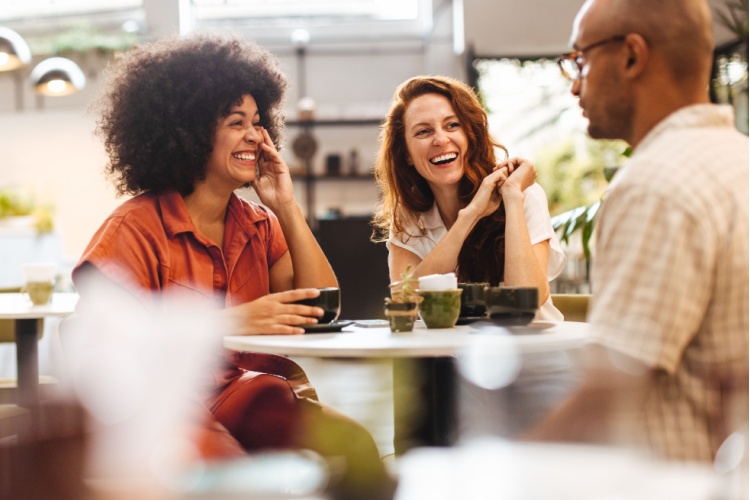 A group of friends talking in a café.