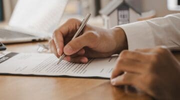 A man checking paperwork.