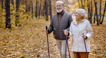 Two people hiking in the woods.