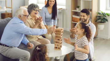 Grandparents playing a game with their grandchildren.