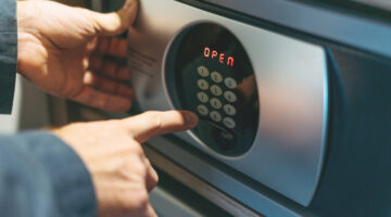 Someone opening a safe.